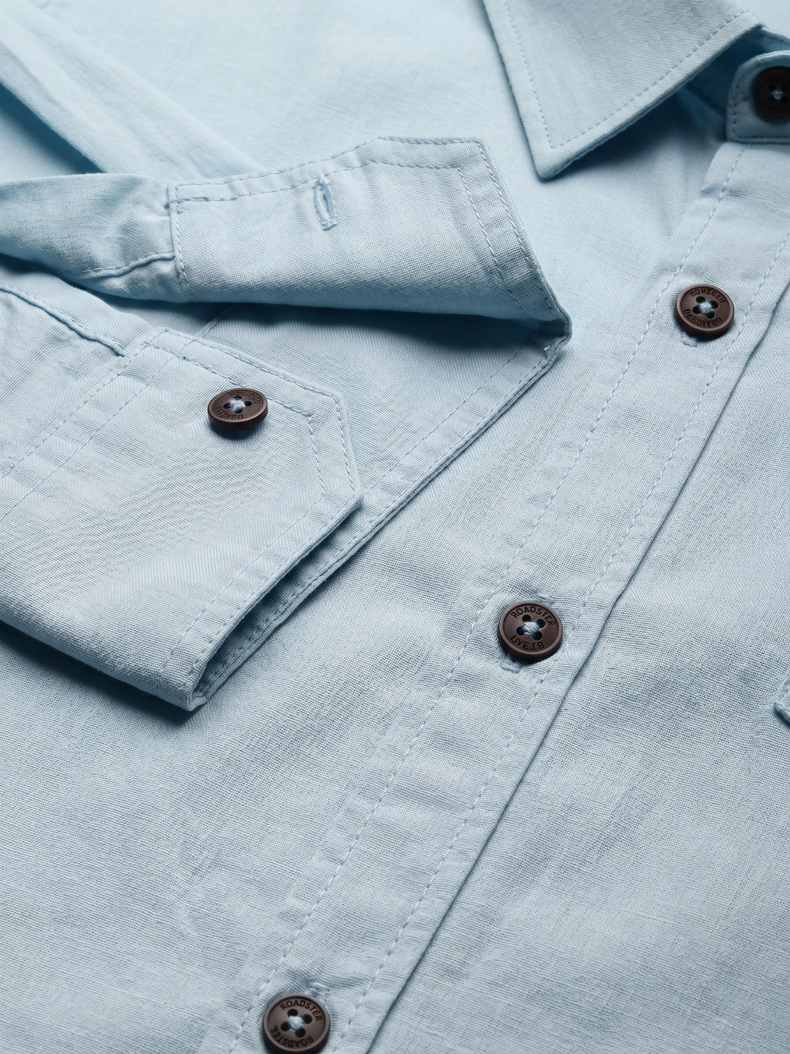 Image of Roadster Men Solid Casual Light Blue Shirt