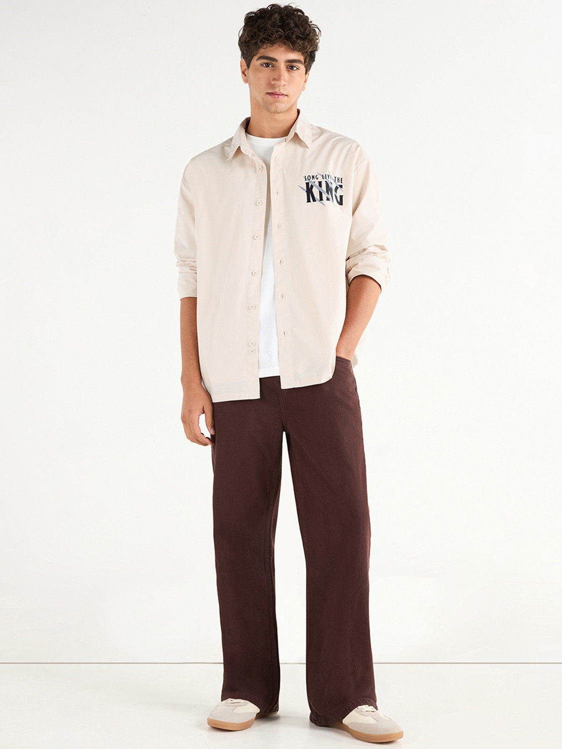 Image of BEWAKOOF Men Graphic Print Casual Beige Shirt