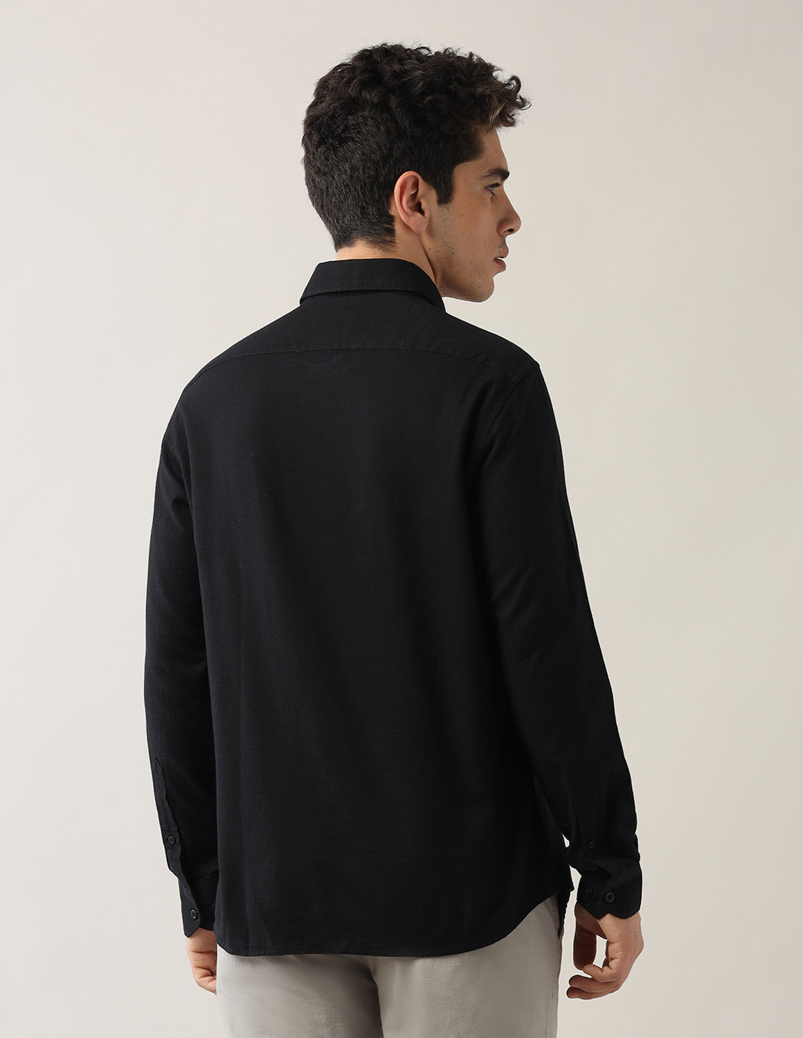 Image of Arrow Sport Men Solid Casual Black Shirt