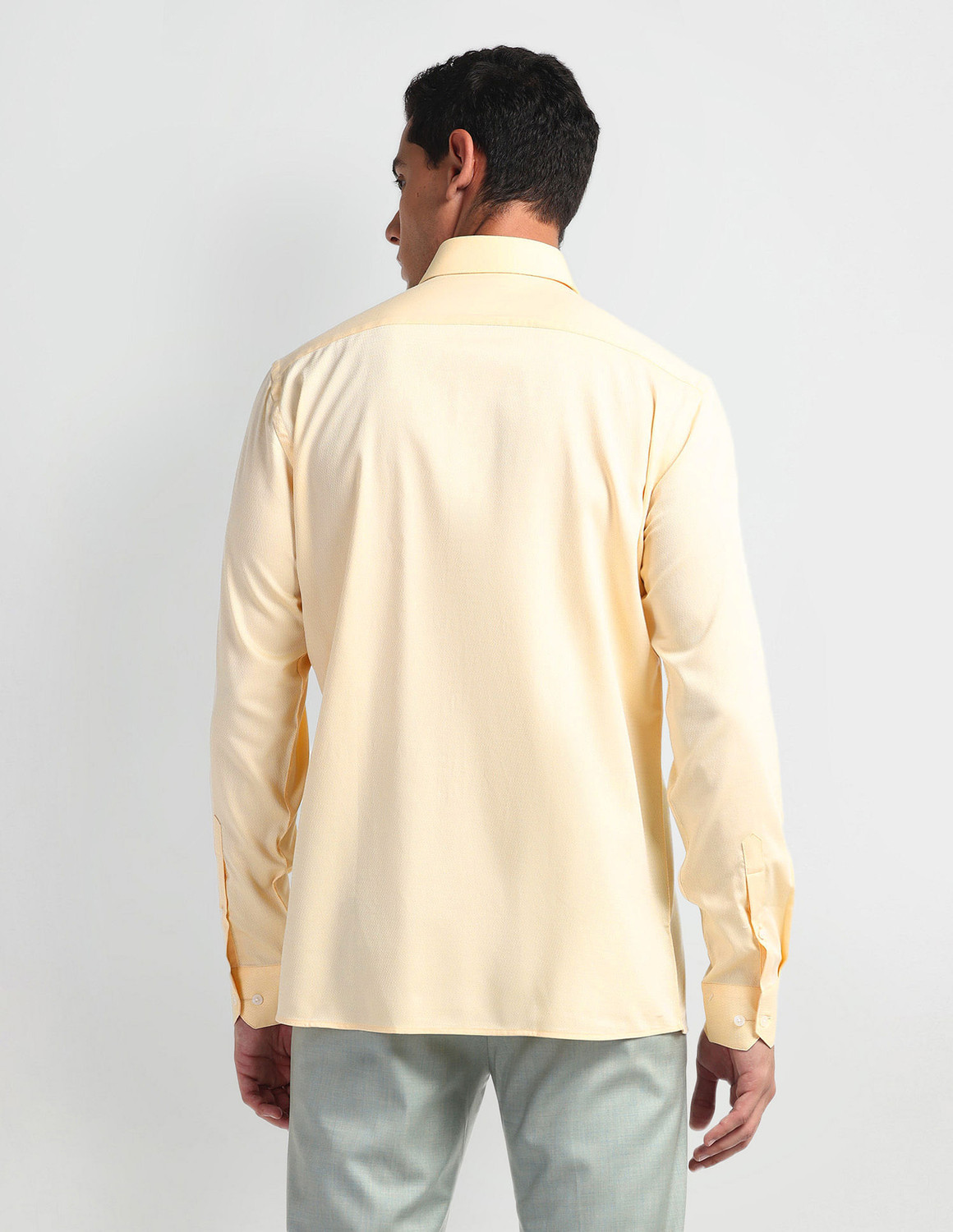 Image of ARROW Men Self Design Formal Yellow Shirt