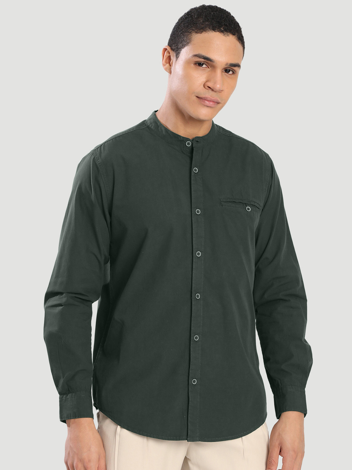 Image of Roadster Men Solid Casual Dark Green Shirt