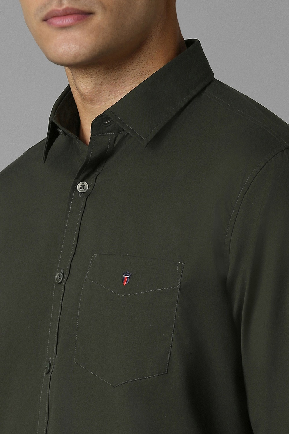 Image of Louis Philippe Sport Men Solid Casual Dark Green Shirt