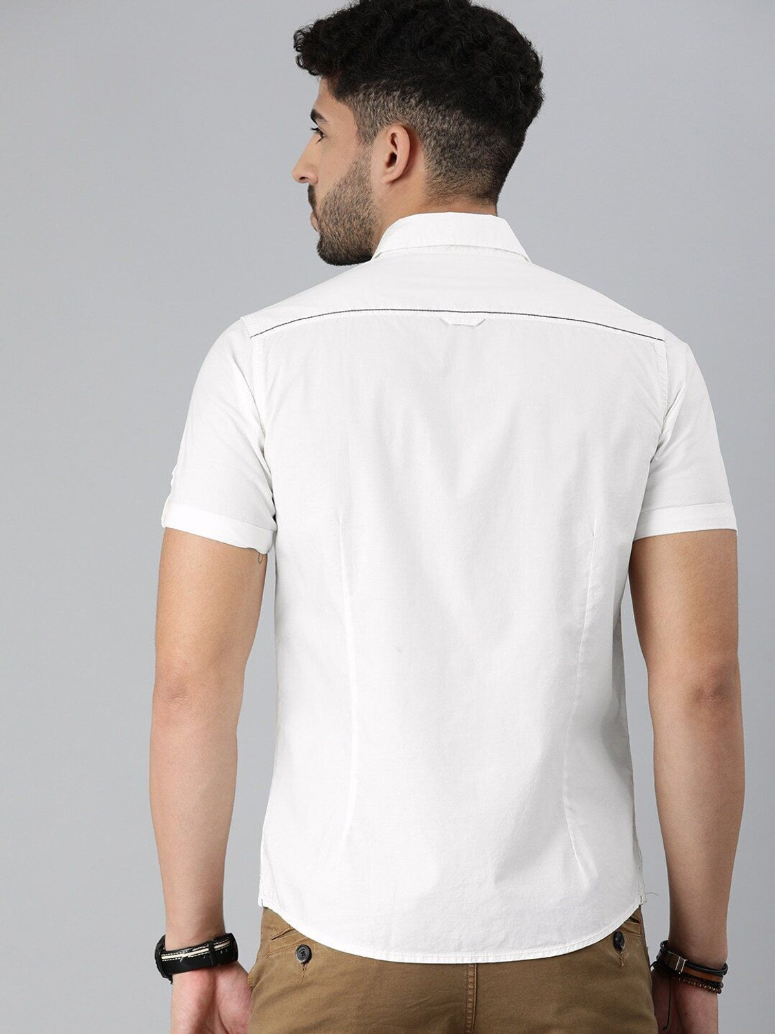 Image of Roadster Men Solid Casual White Shirt