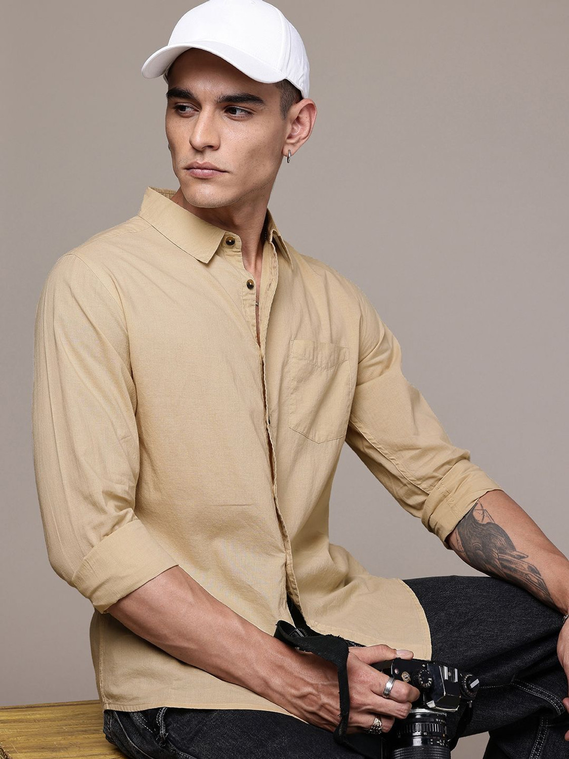 Image of Roadster Men Solid Casual Beige Shirt