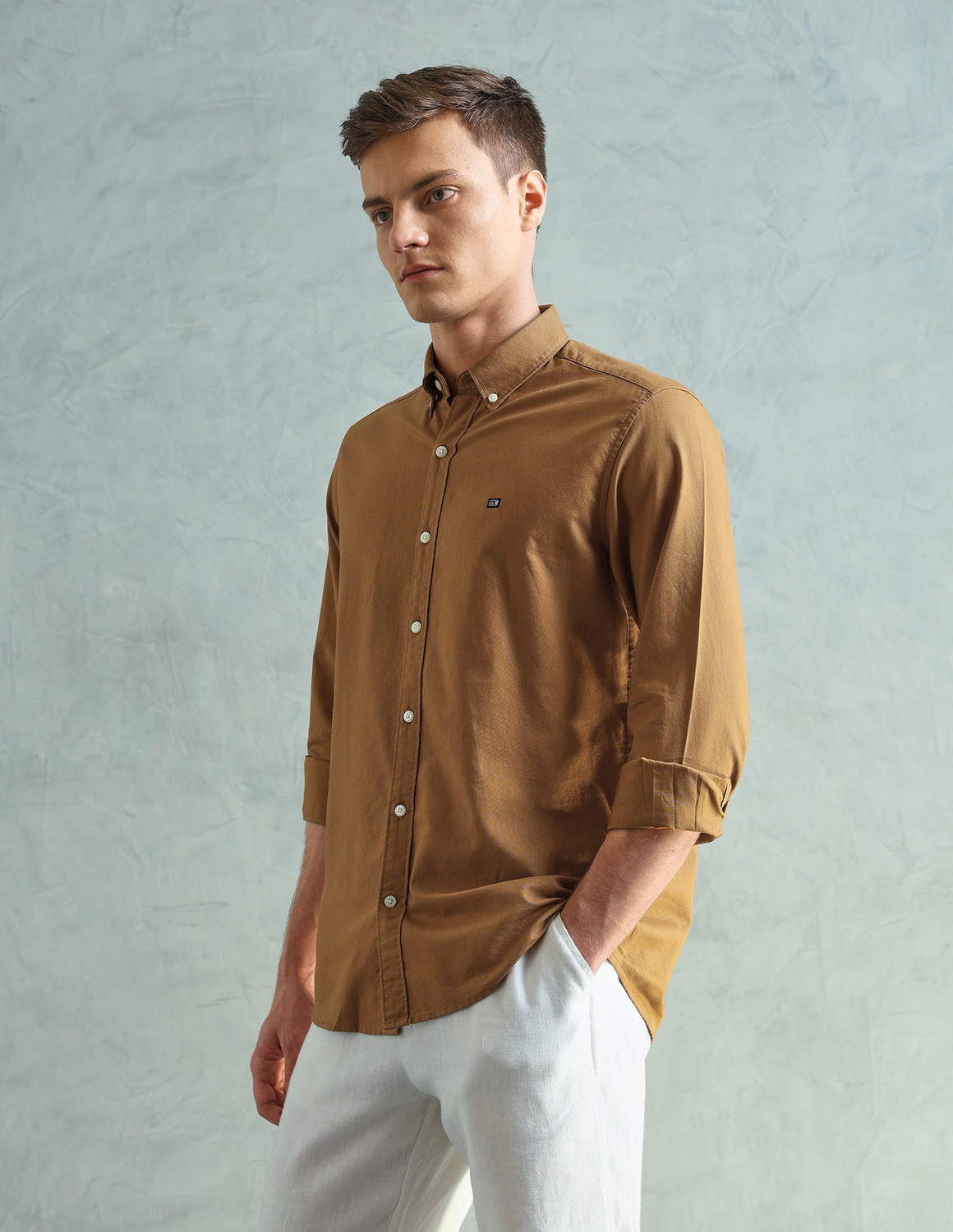 Image of Arrow Sport Men Solid Casual Orange Shirt