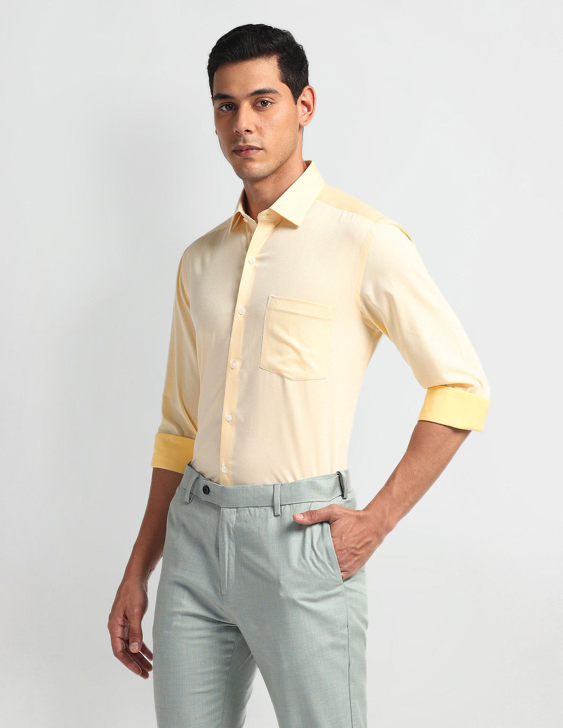 Image of ARROW Men Self Design Formal Yellow Shirt