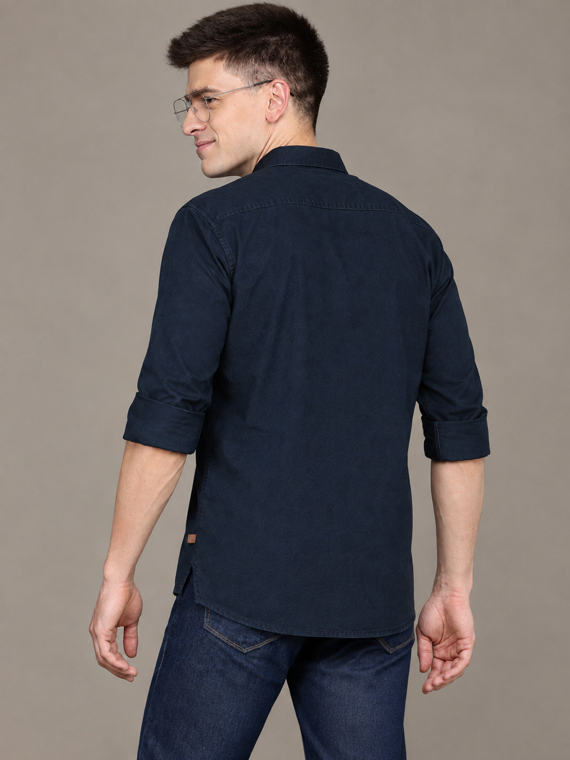 Image of Roadster Men Regular Fit Solid Spread Collar Casual Shirt