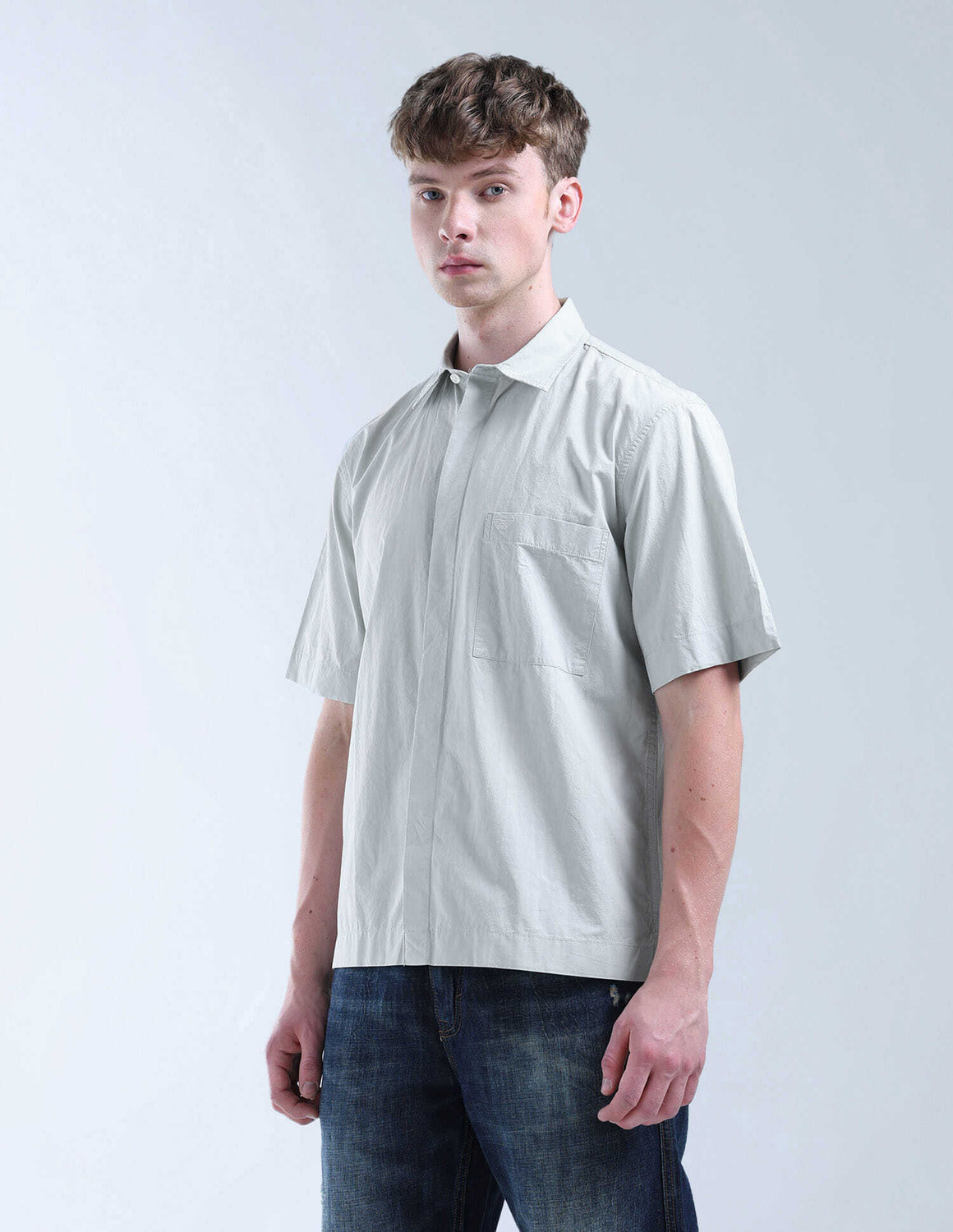 Image of FLYING MACHINE Men Solid Casual Green Shirt