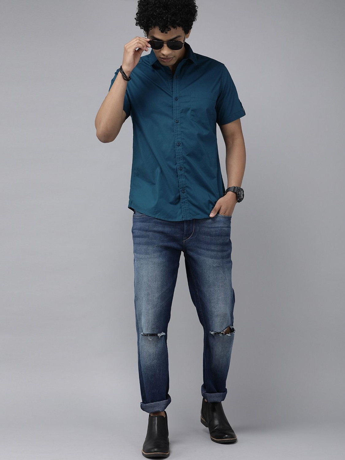 Image of Roadster Men Solid Casual Blue Shirt