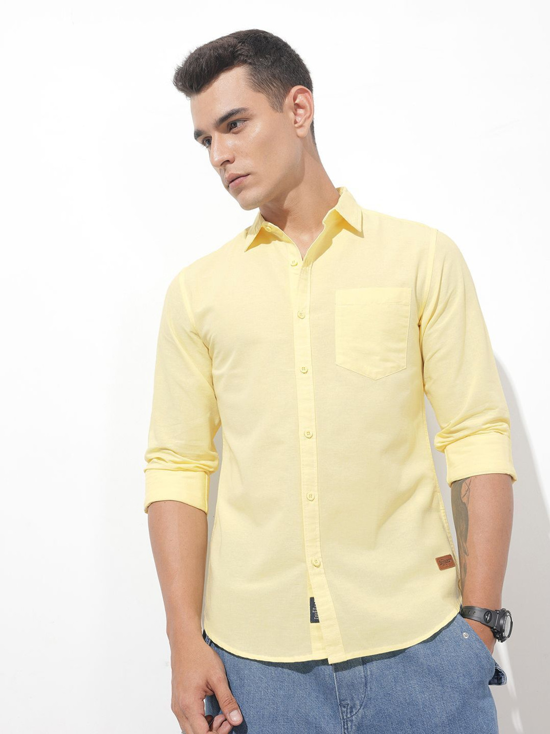 Image of Roadster Men Solid Casual Yellow Shirt