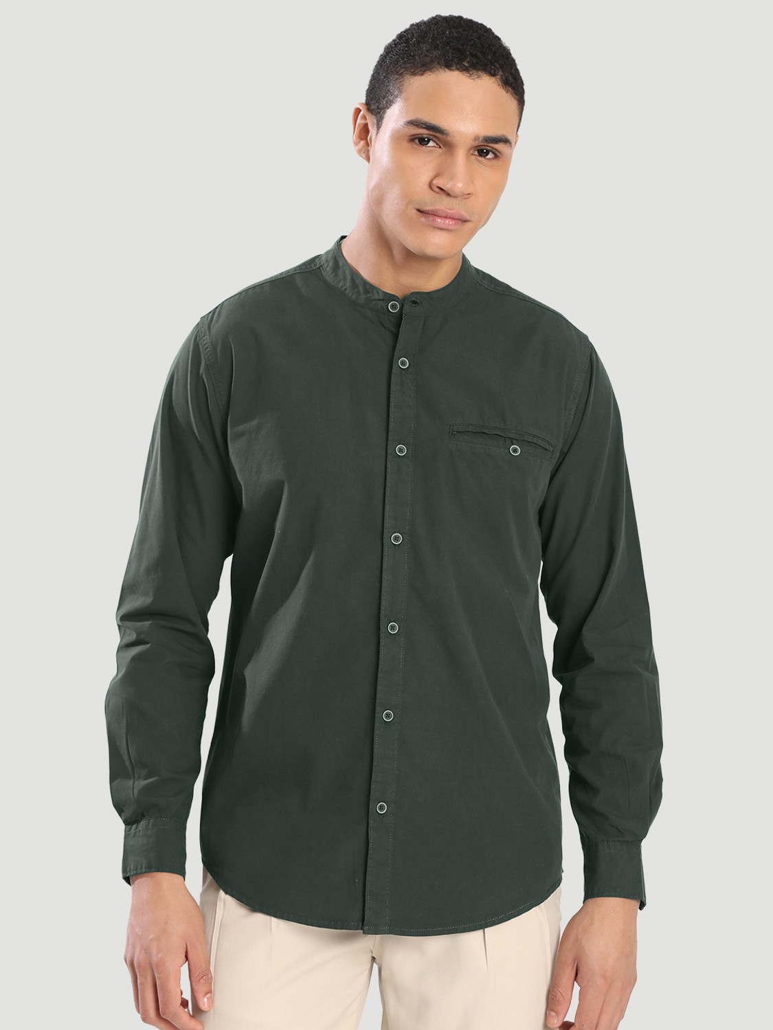 Image of Roadster Men Solid Casual Dark Green Shirt
