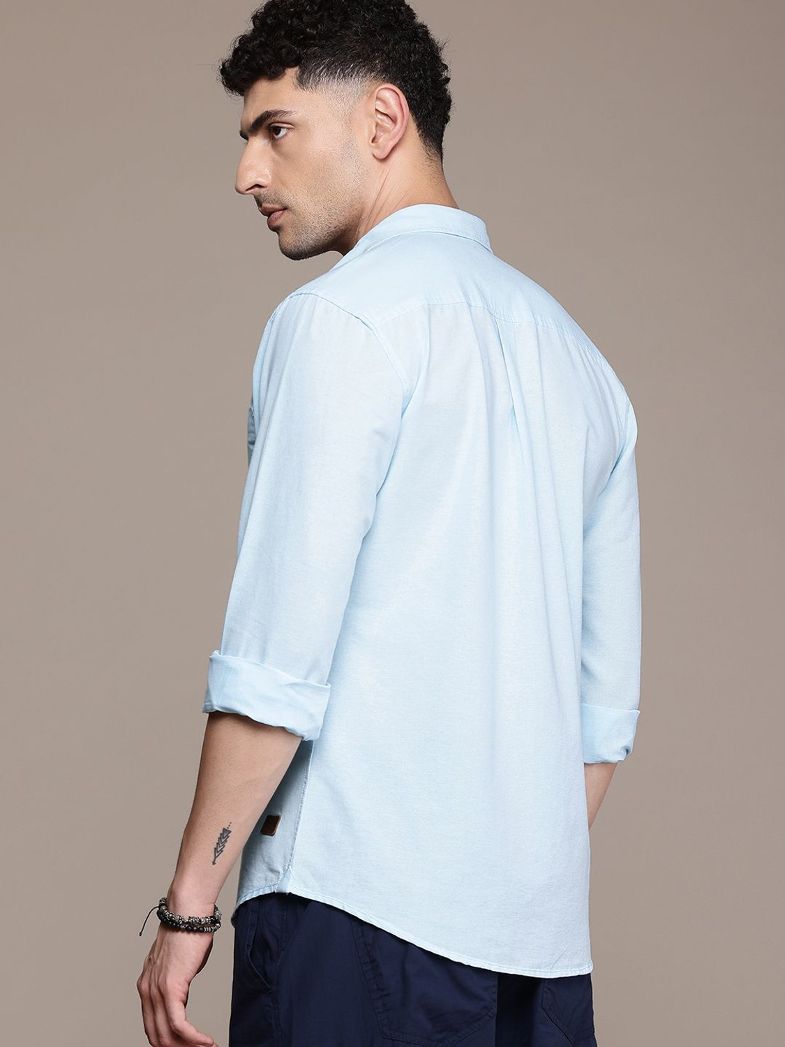 Image of Roadster Men Solid Casual Blue Shirt