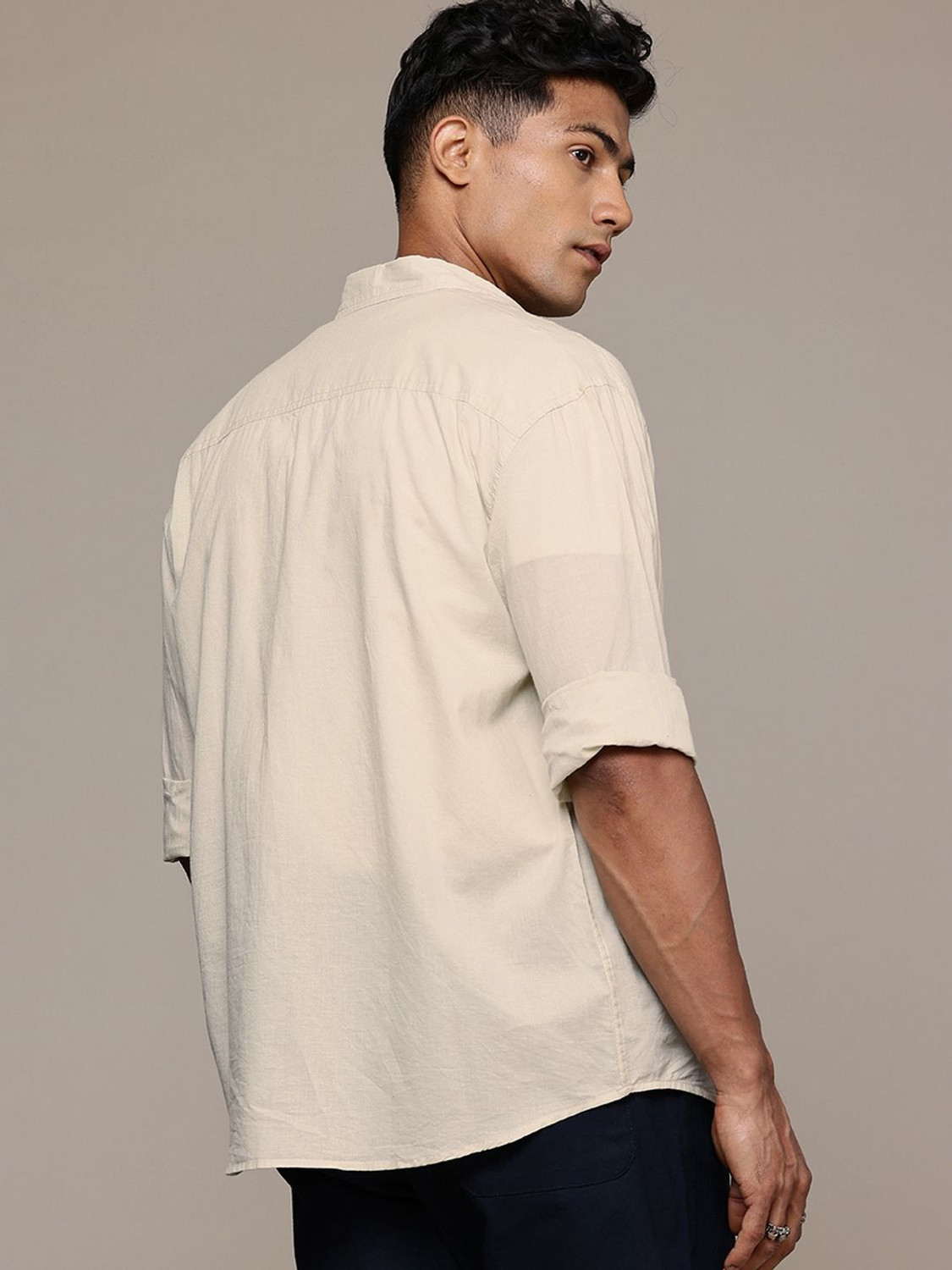 Image of Roadster Men Solid Casual Beige Shirt