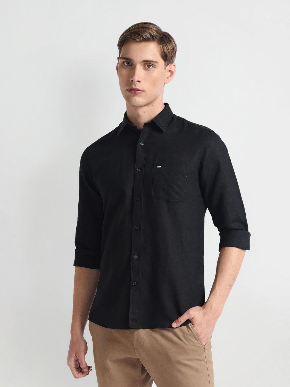 Image of Arrow Sport Men Solid Casual Black Shirt