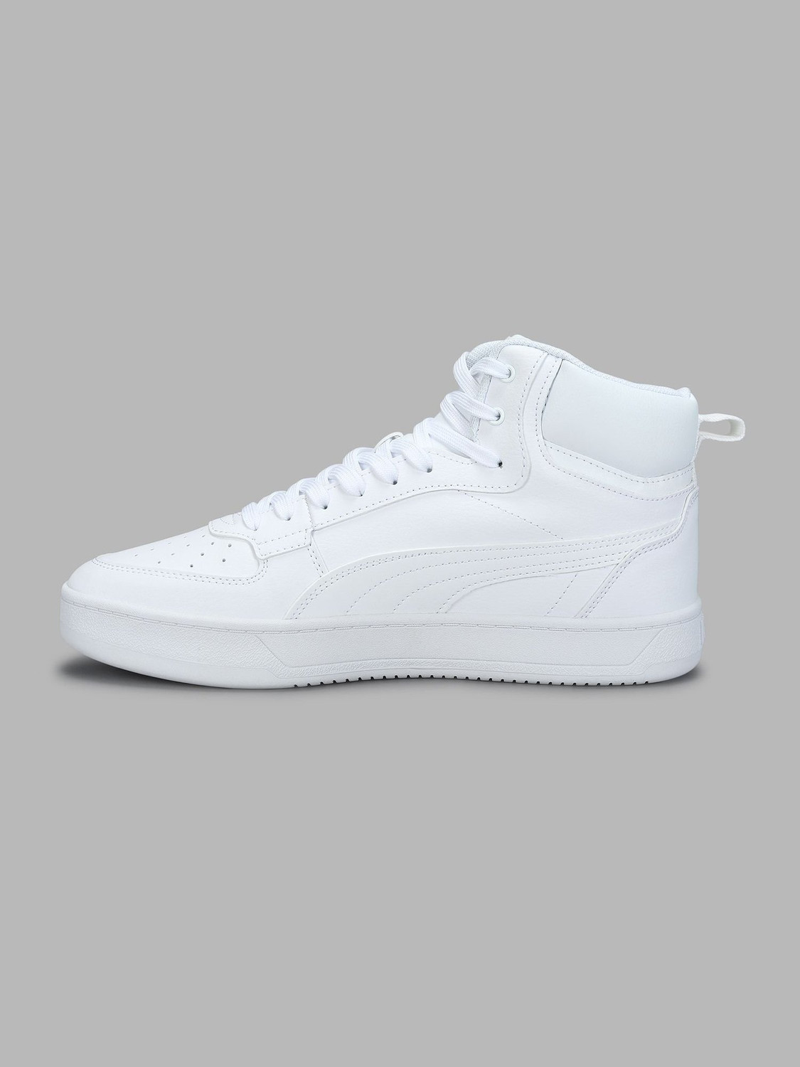 Image of PUMA Caven 2.0 Mid Sneakers For Men