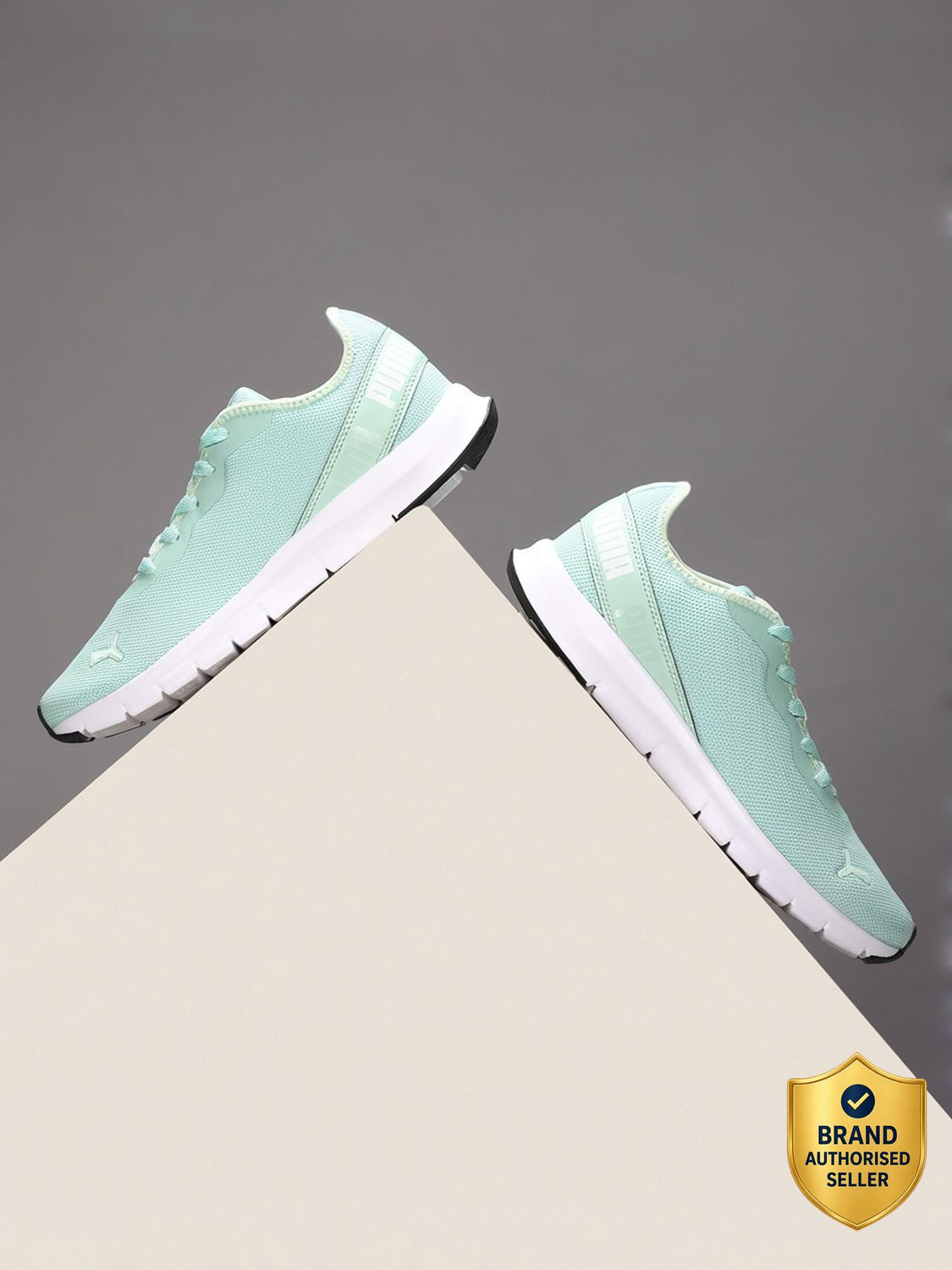 Image of PUMA Hustle V2s Sneakers For Women
