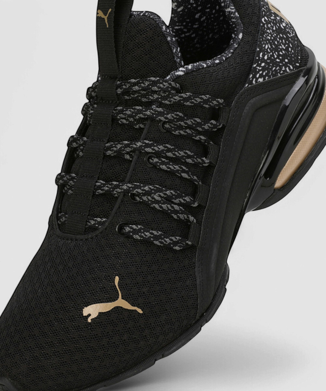 Image of PUMA Axelion Minima Leopards Running Shoes For Women