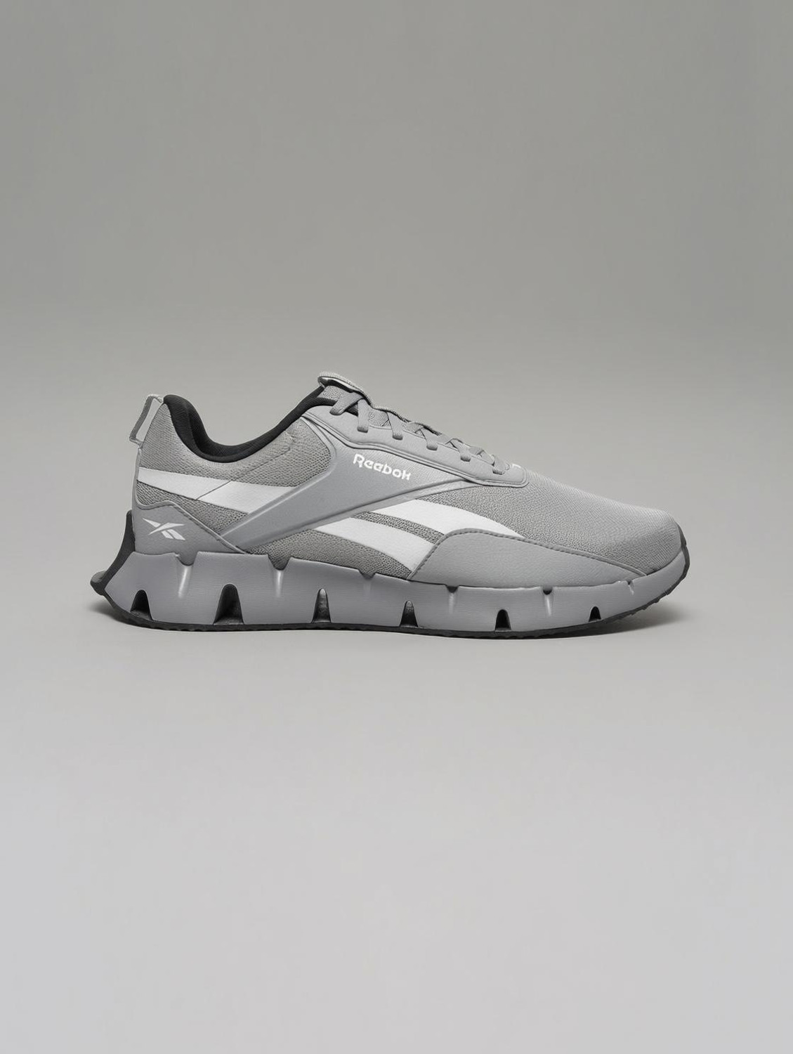 Image of REEBOK Running Shoes For Men (Grey, 8)