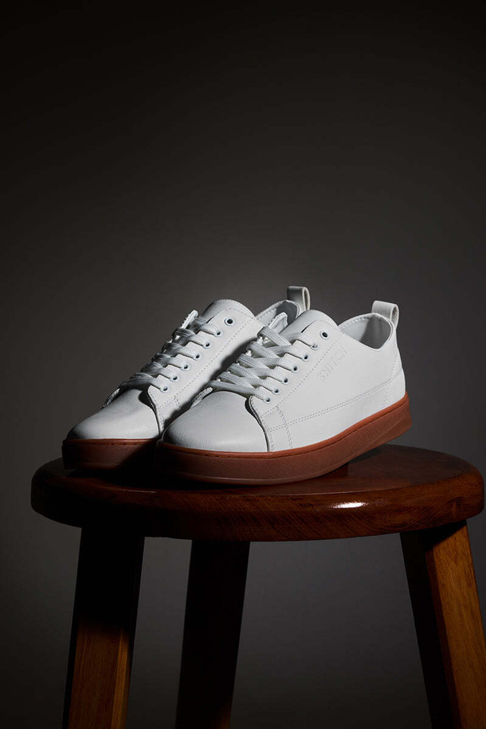 Image of Snitch White Solid Sneakers Sneakers For Men