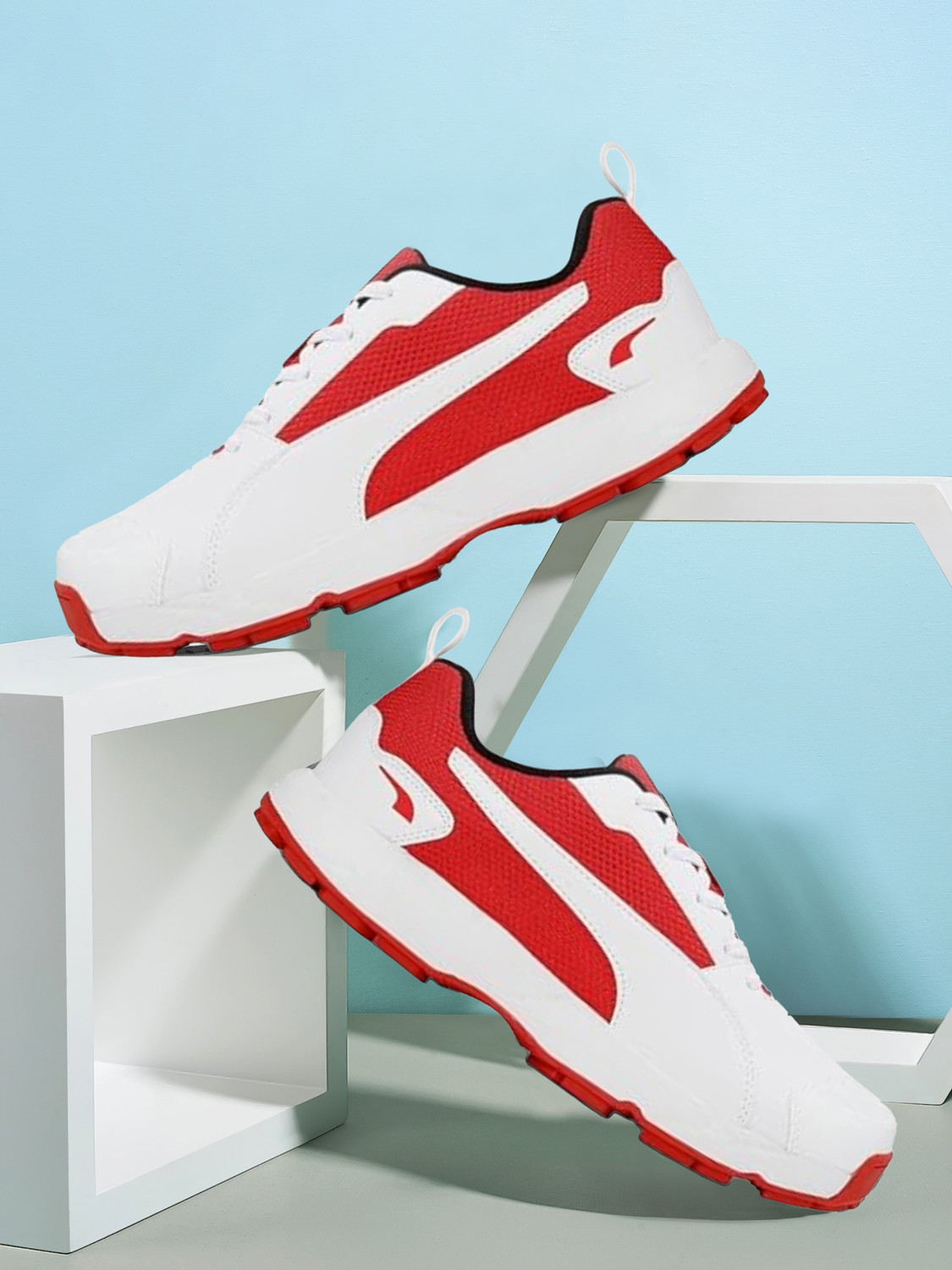 Image of PUMA Cricket HighRun Cricket Shoes For Men