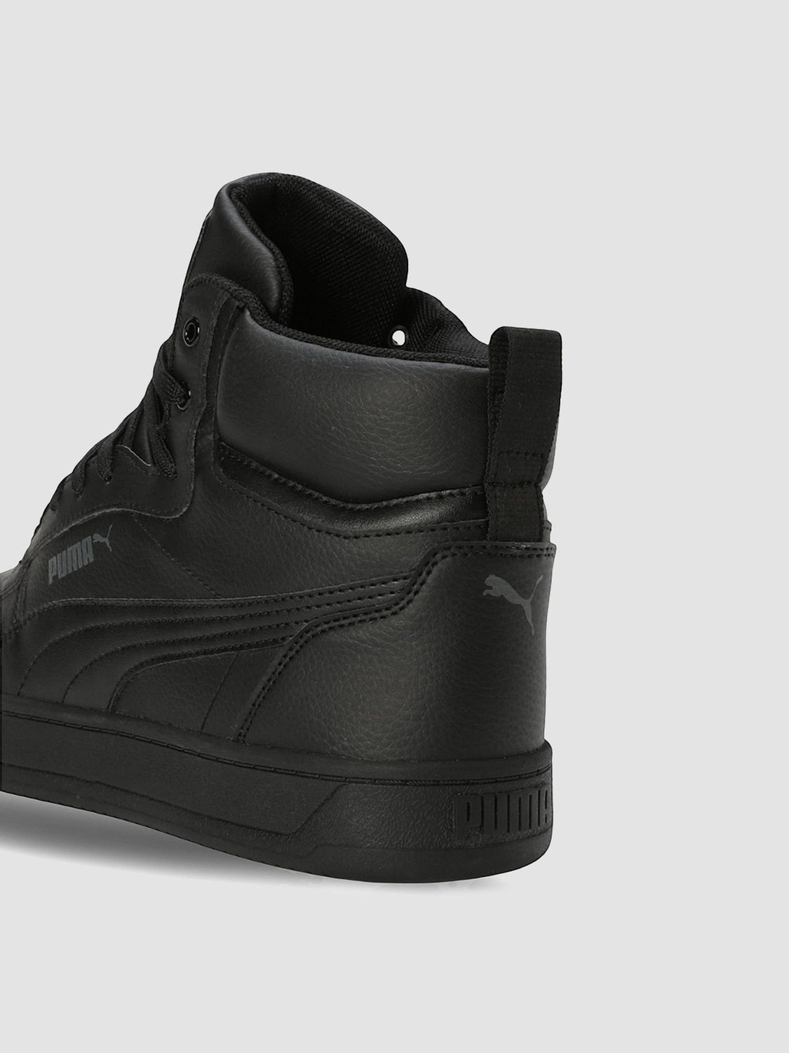 Image of PUMA Caven 2.0 Mid Sneakers For Men