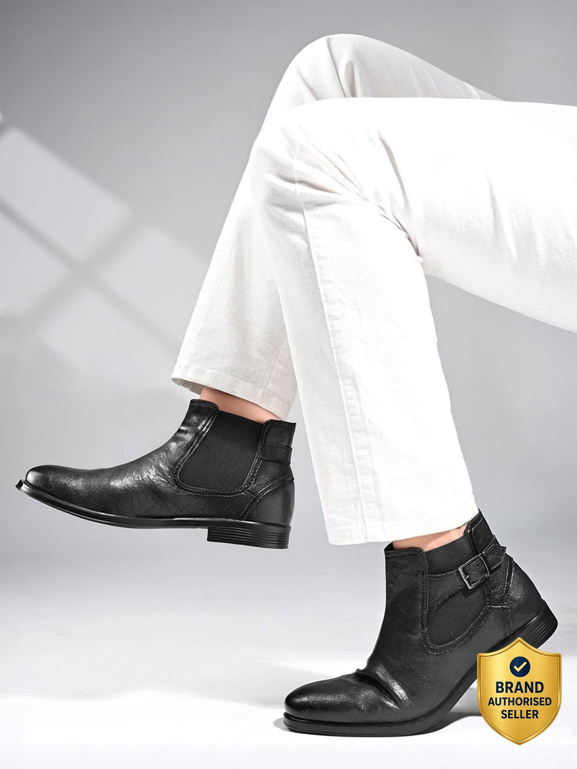 Image of LOUIS STITCH Obsidian Black Mid-Top Ankle Shrunken Chelsea Boots for Men with Side Buckle Boots For Men