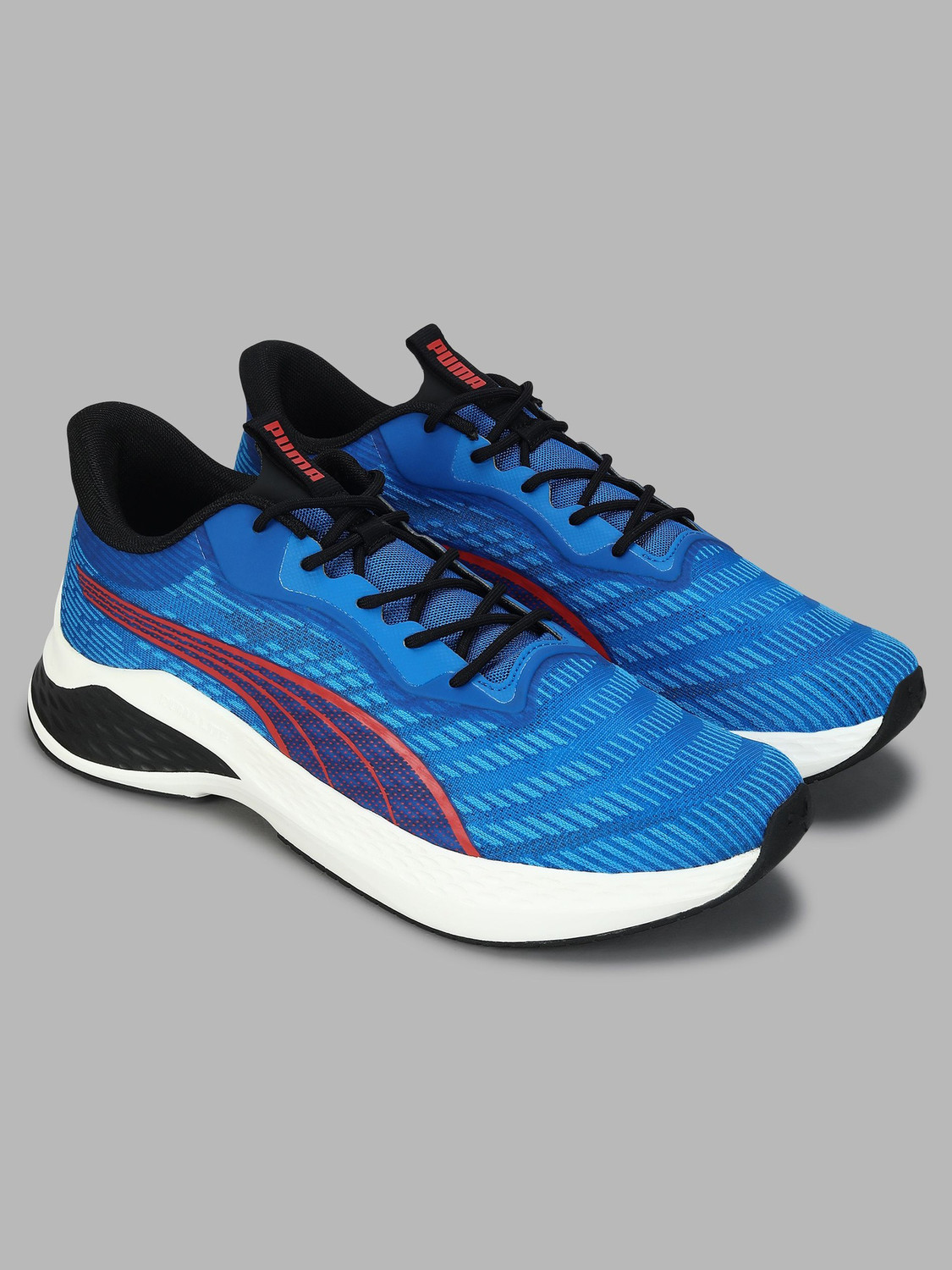 Image of PUMA KnitGrid Running Shoes For Men
