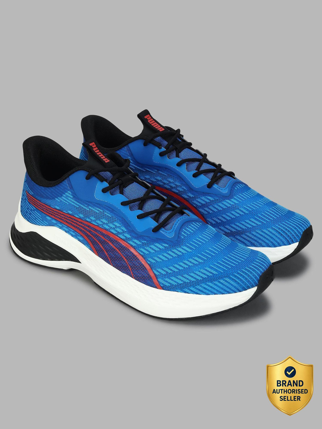 Image of PUMA KnitGrid Running Shoes For Men