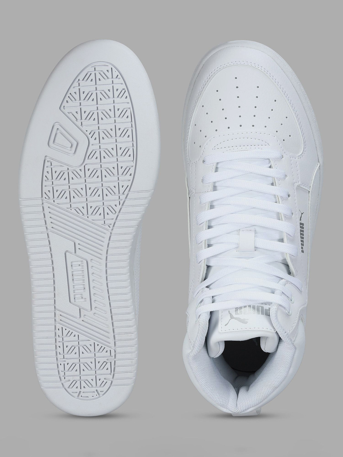 Image of PUMA Caven 2.0 Mid Sneakers For Men