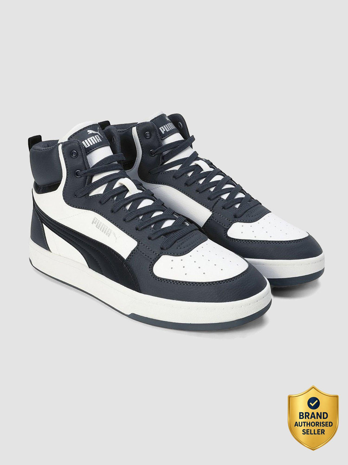 Image of PUMA Caven 2.0 Mid Sneakers For Men