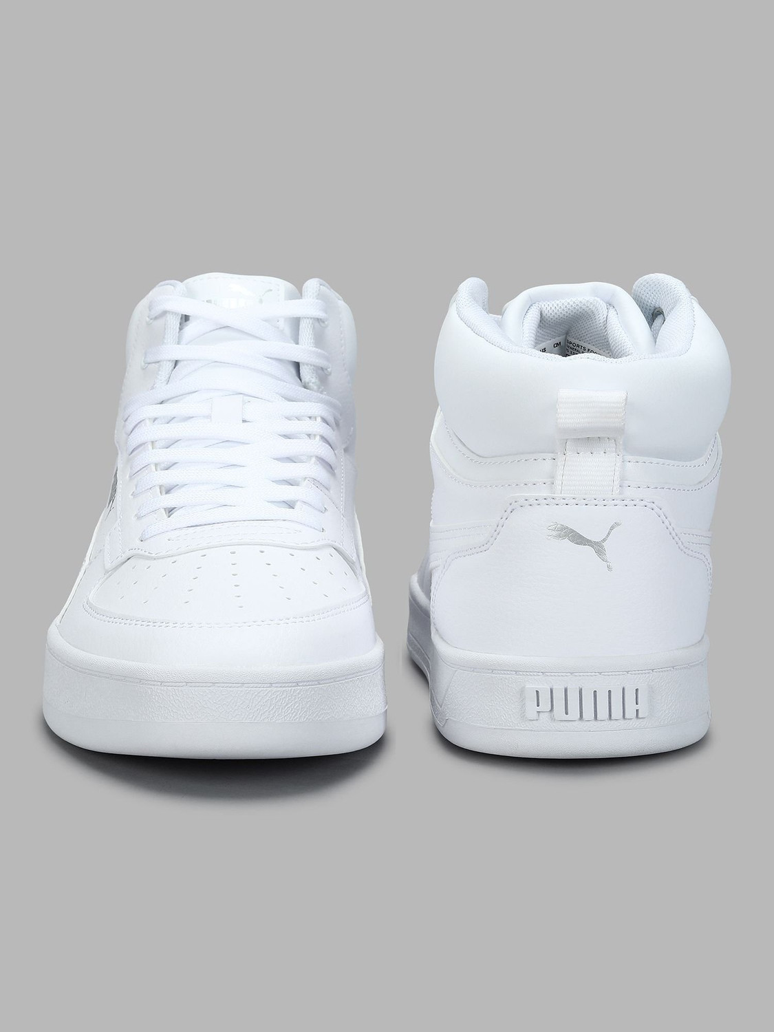 Image of PUMA Caven 2.0 Mid Sneakers For Men