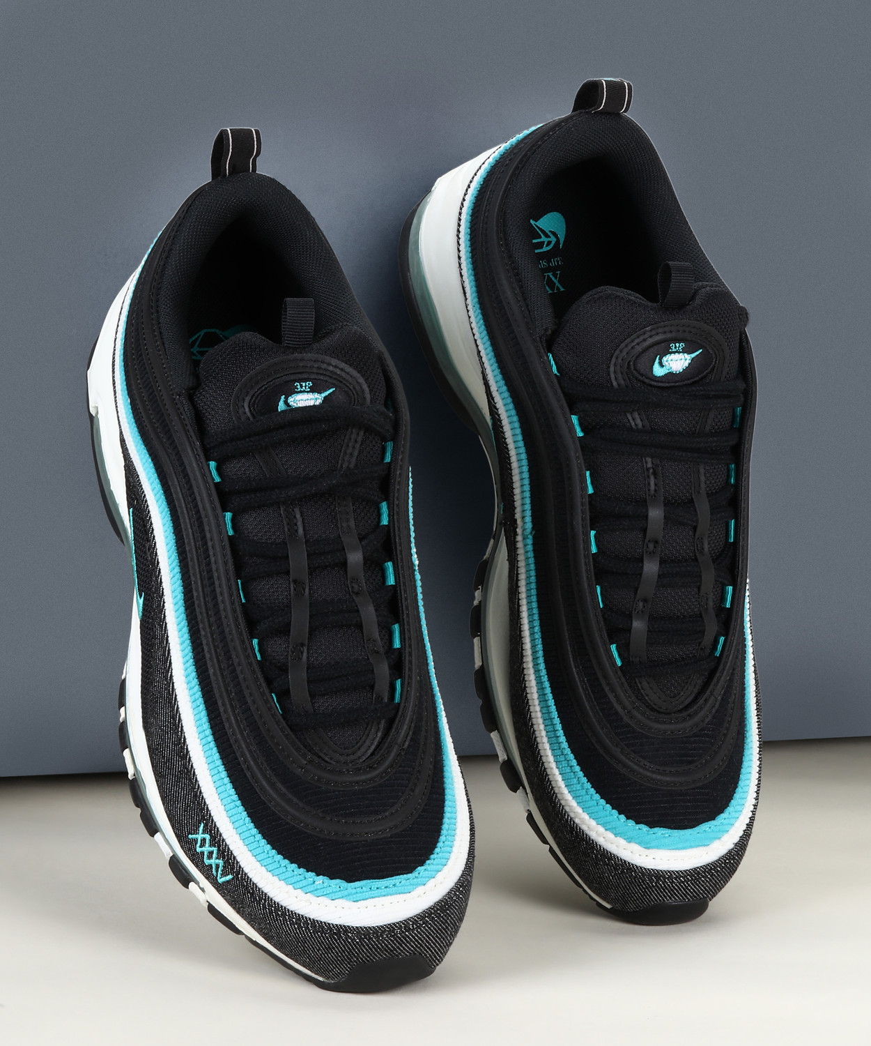 black and teal air max 97