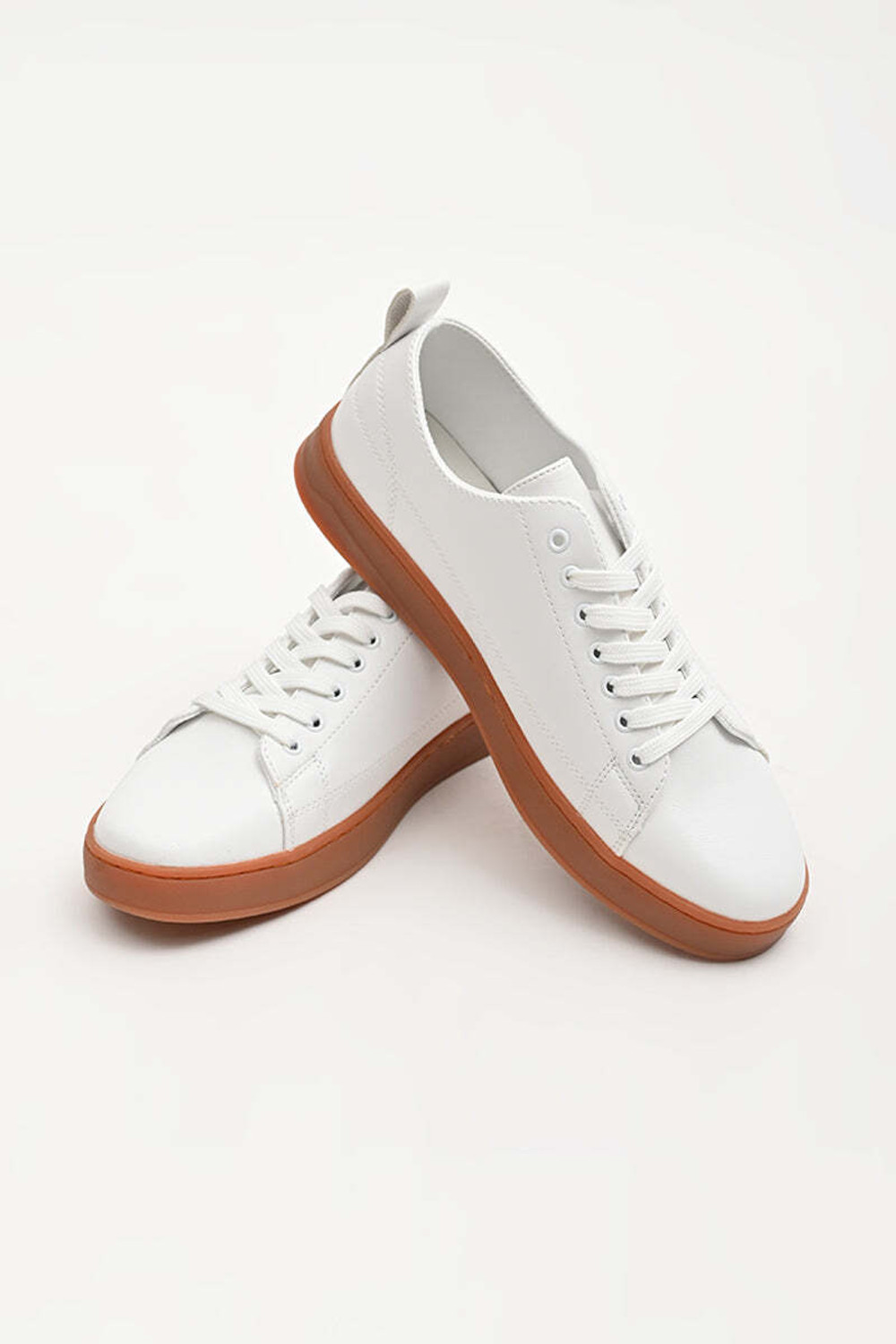 Image of Snitch White Solid Sneakers Sneakers For Men