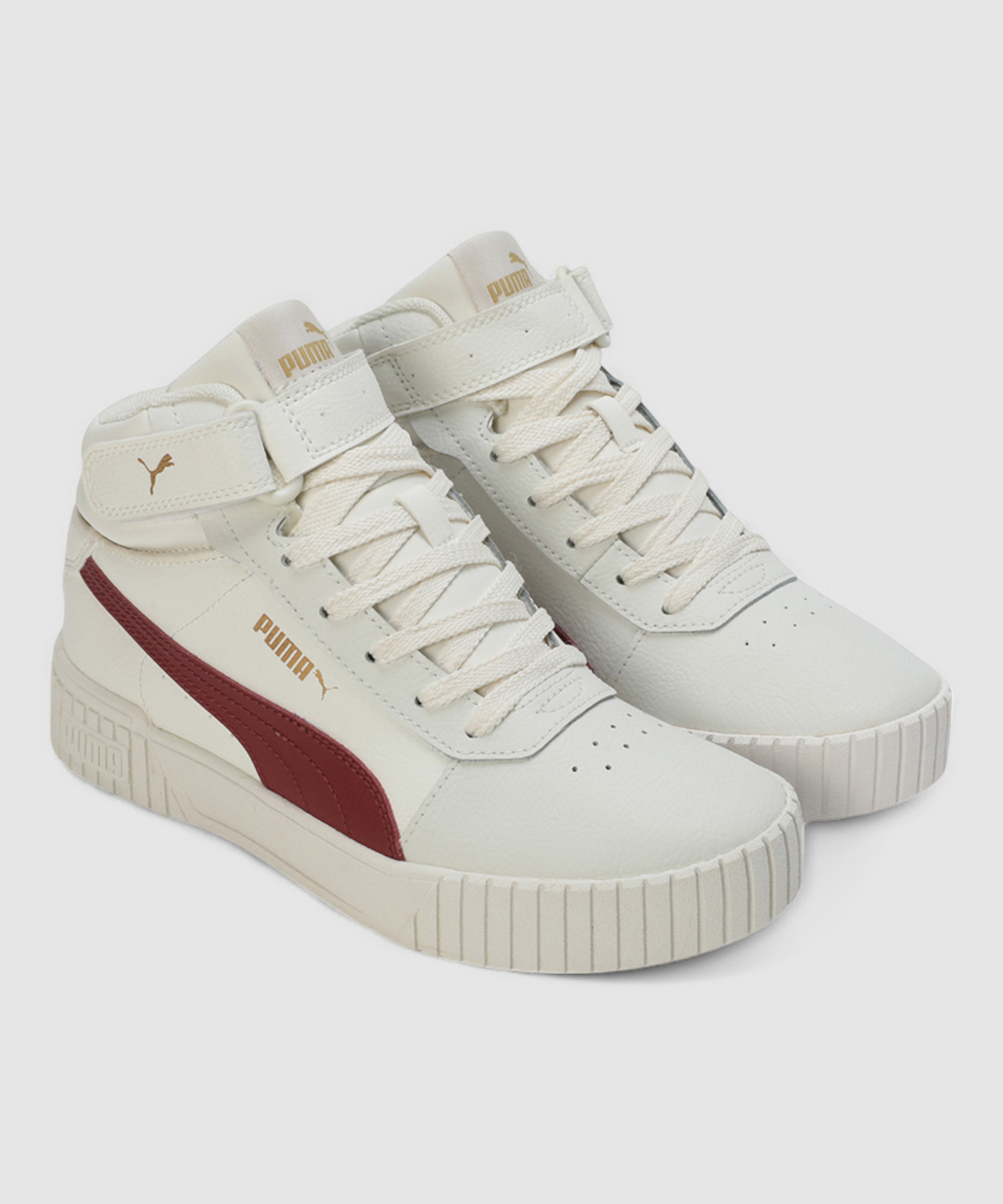 Image of PUMA Carina 2.0 Mid Sneakers For Women