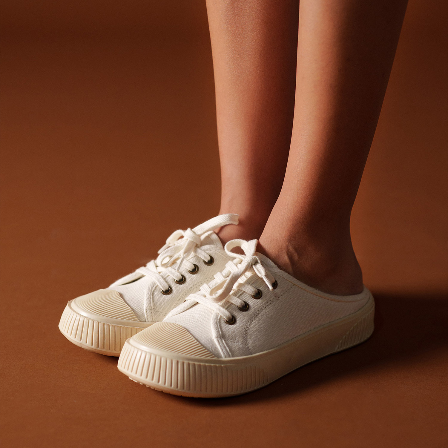 Image of Theater Elves White Slide-in Sneakers Canvas Shoes For Women