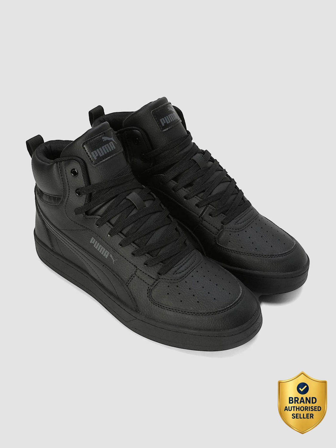 Image of PUMA Caven 2.0 Mid Sneakers For Men