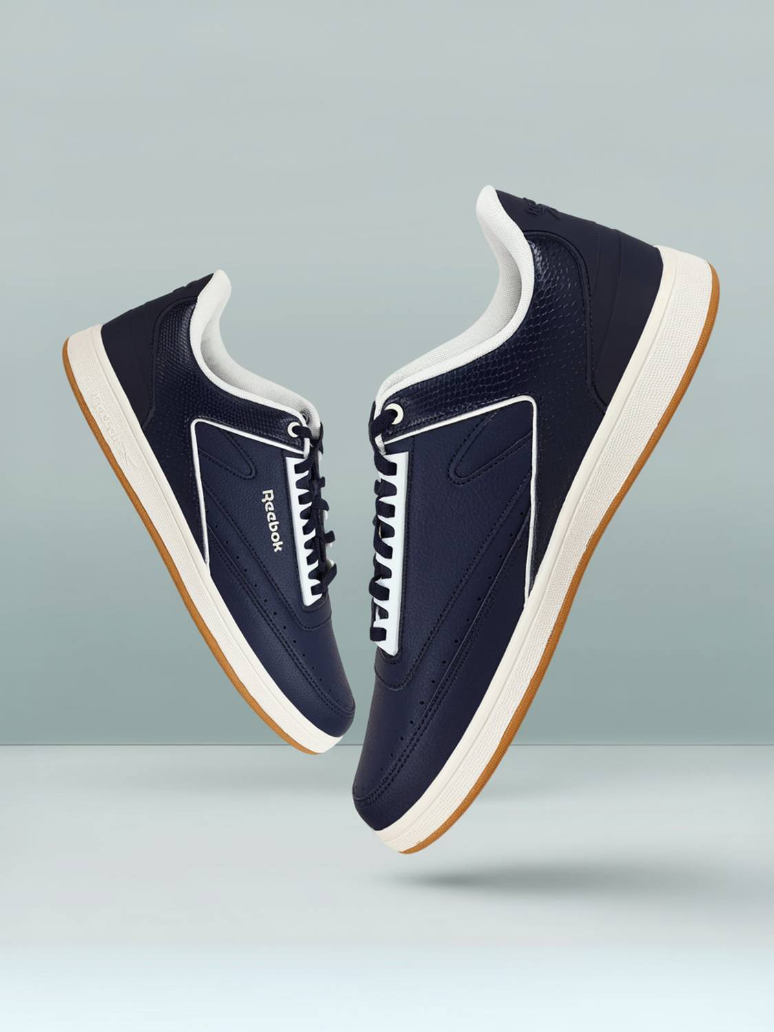 ra-11957 Buy Reebok Unisex Perforated Courtswift Effort Sneakers - Casual