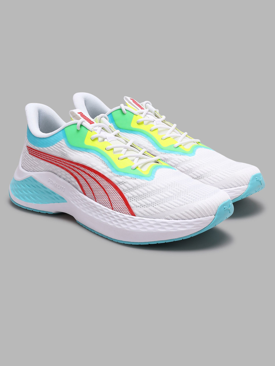Image of PUMA KnitGrid Running Shoes For Men