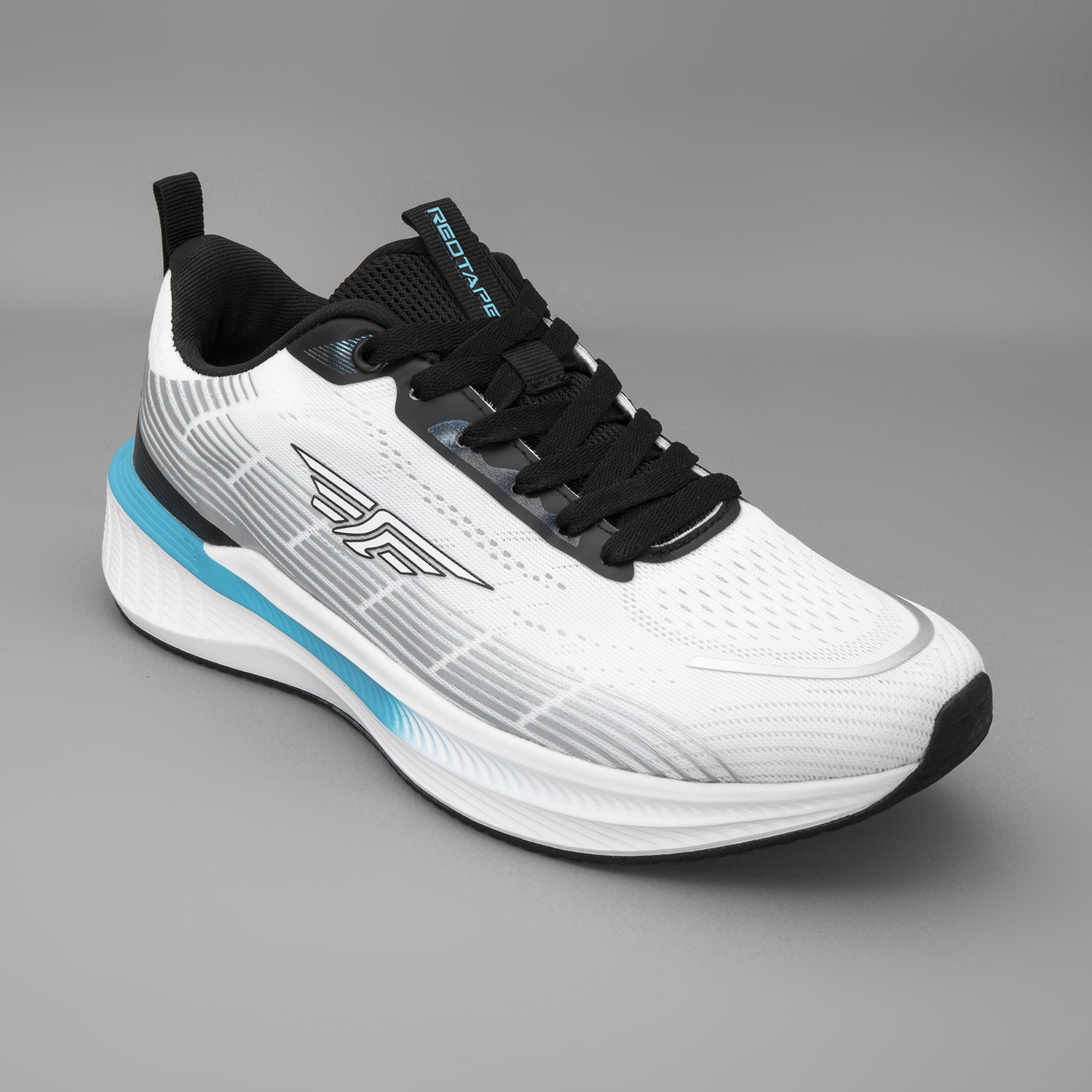 Image of RED TAPE Low Cut Sports Shoes for Men in White Blue | Sports Shoes Walking Shoes For Men
