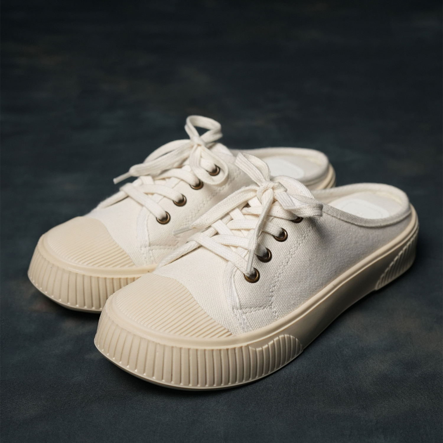 Image of Theater Elves White Slide-in Sneakers Canvas Shoes For Women