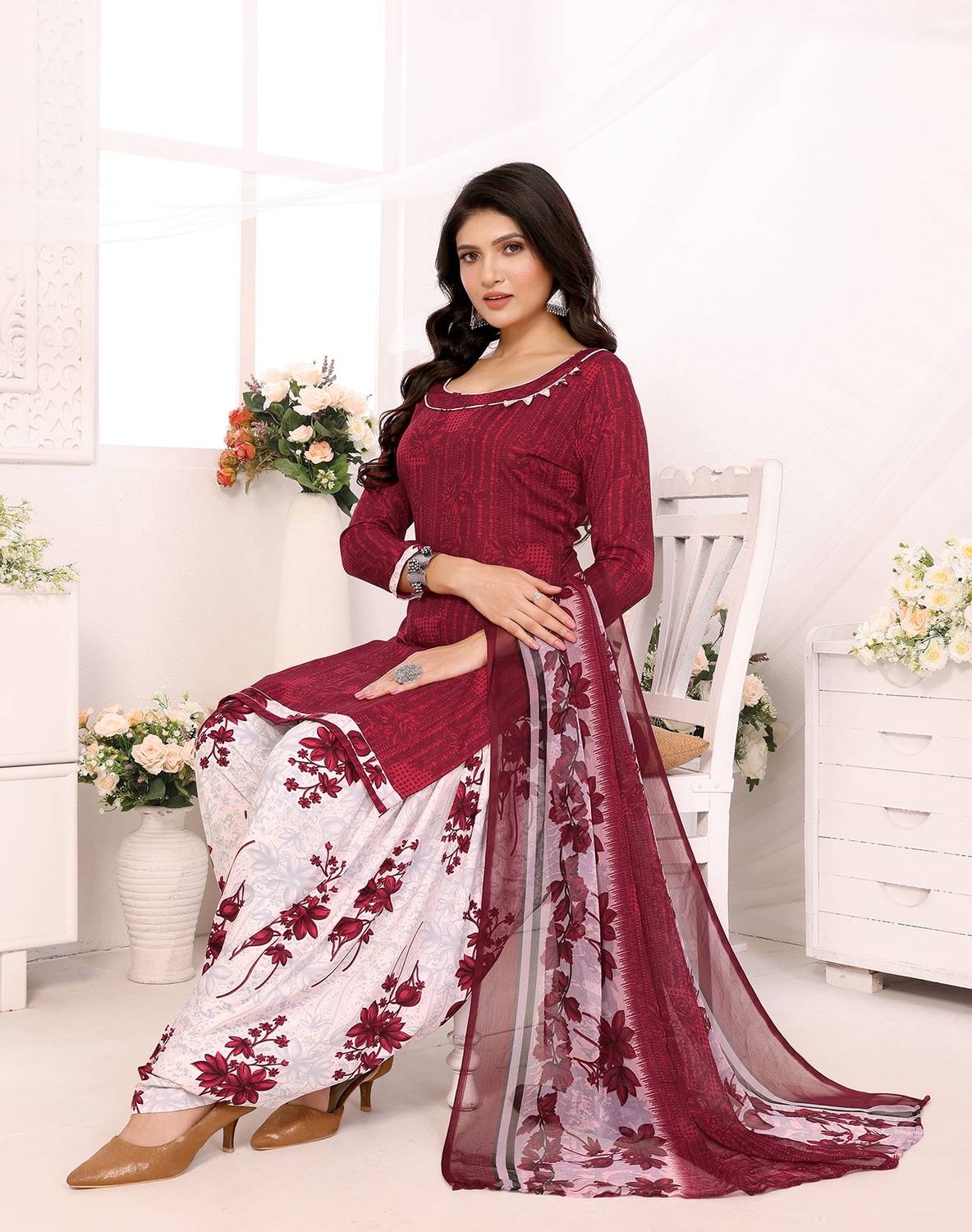 The Aumki Crepe Printed Salwar Suit Material