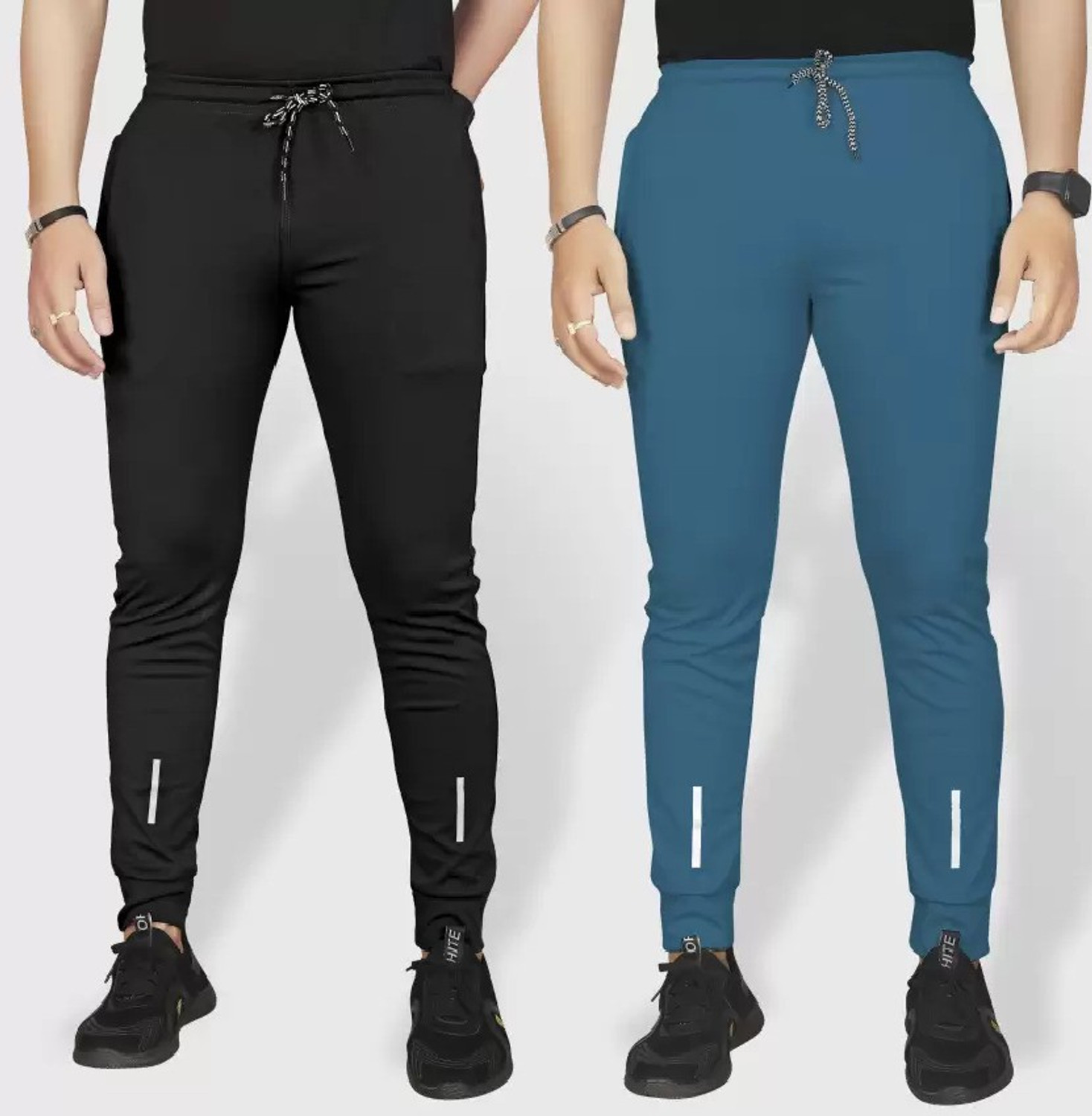 Image of ARJUN Self Design Men Black, Dark Blue Track Pants