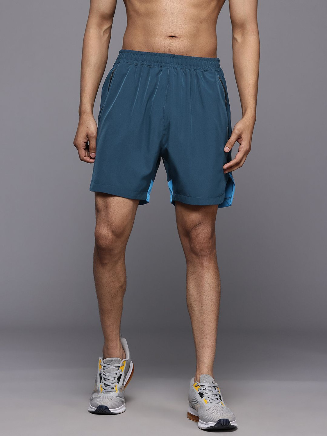 Image of HRX by Hrithik Roshan Solid Men Blue Sports Shorts