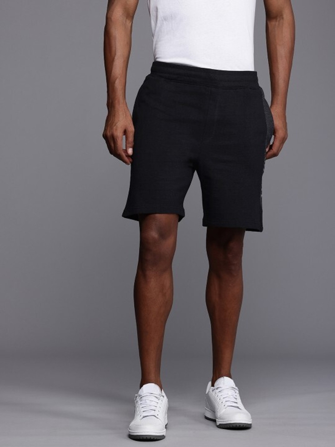 Image of HRX by Hrithik Roshan Self Design Men Black Regular Shorts