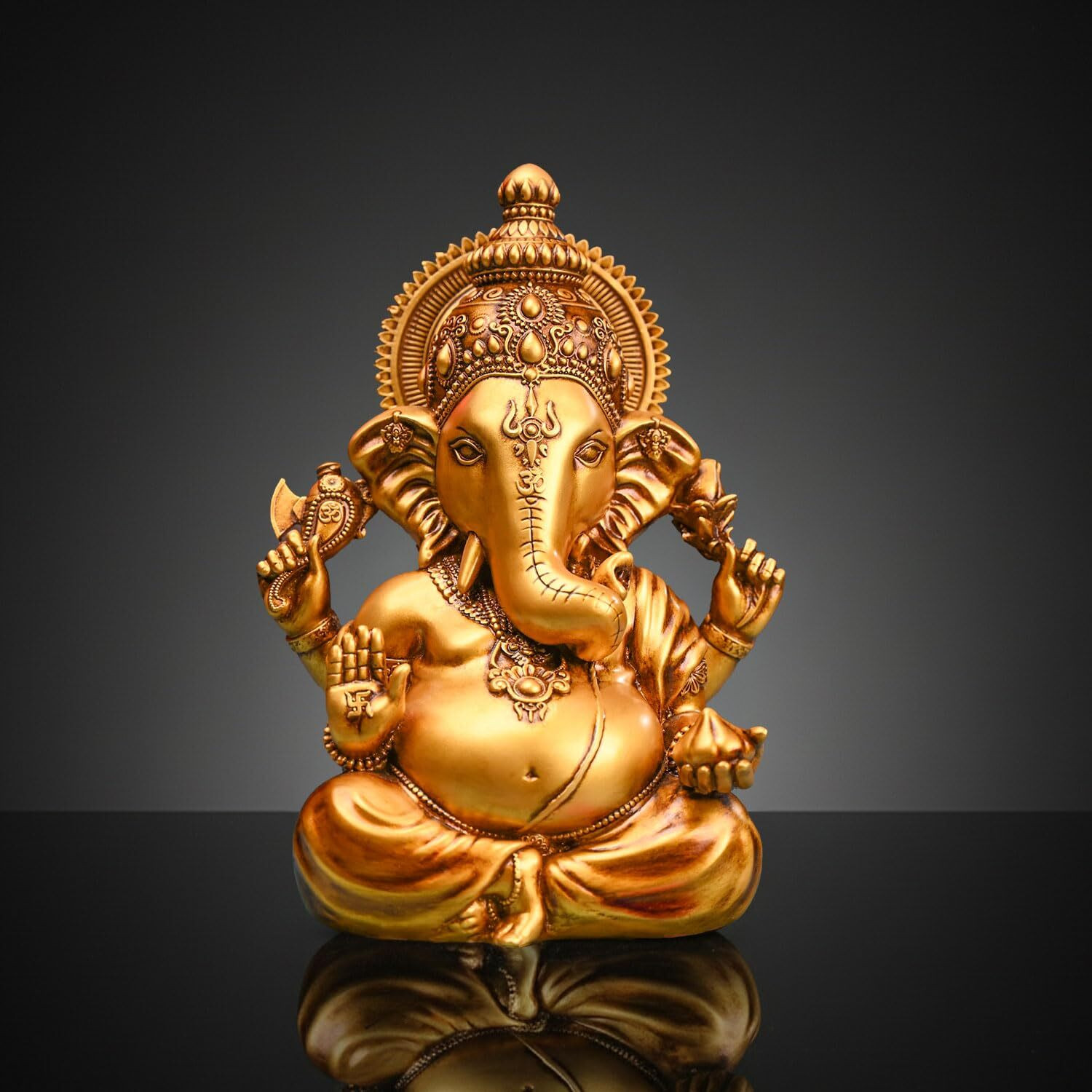 Image of The Divine Tales Vighnaharta Ganesh Idol for Car Dashboard Ganpati Murti Vinayaka Statue for Home Decorative Showpiece - 8.9 cm (Polyresin, Gold)