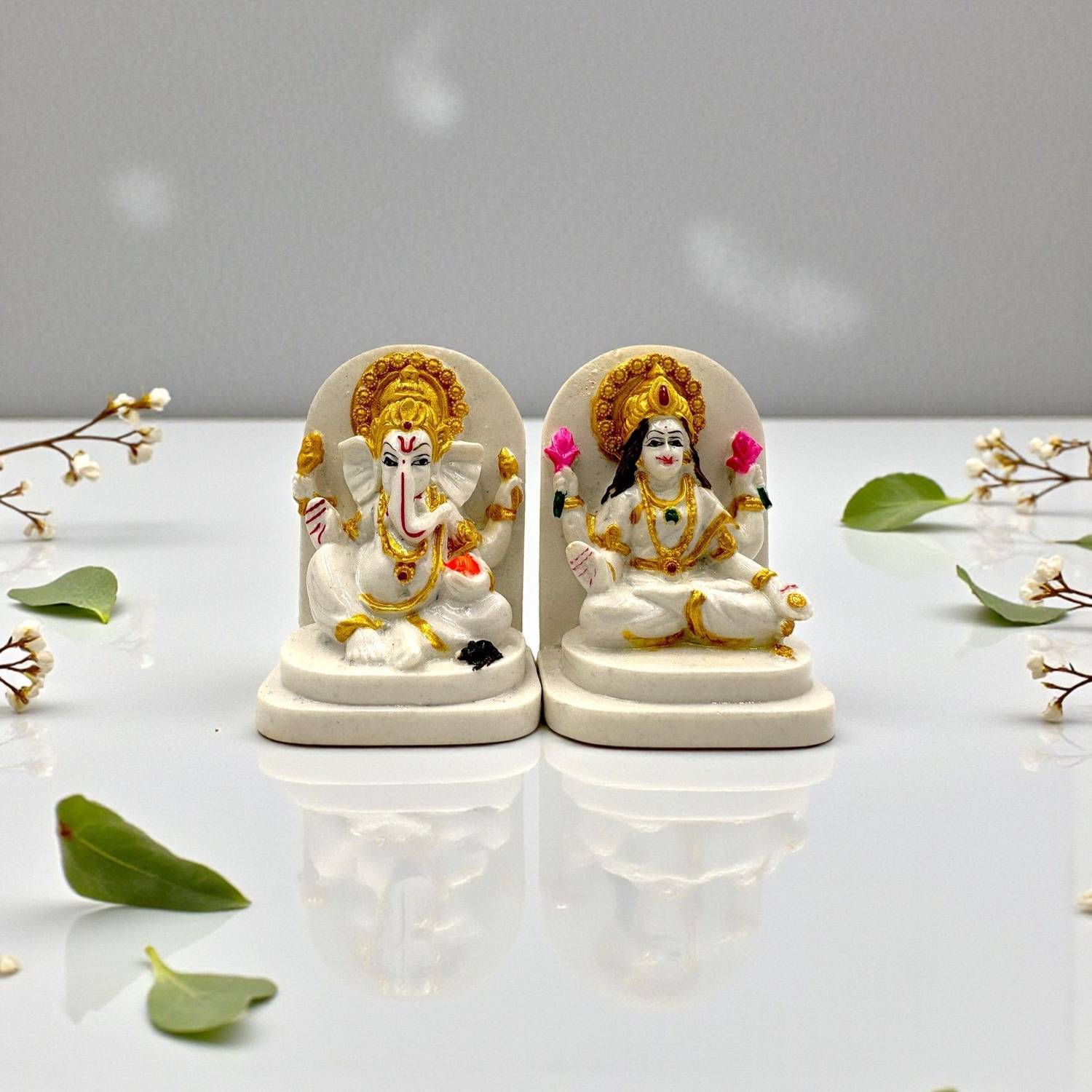 AVG ARTISTRY Laxmi Ganesh Pair Murti Resin Marble Finish Idol Pooja Room Home Mandir Diwali Decorative Showpiece  -  7.5 cm