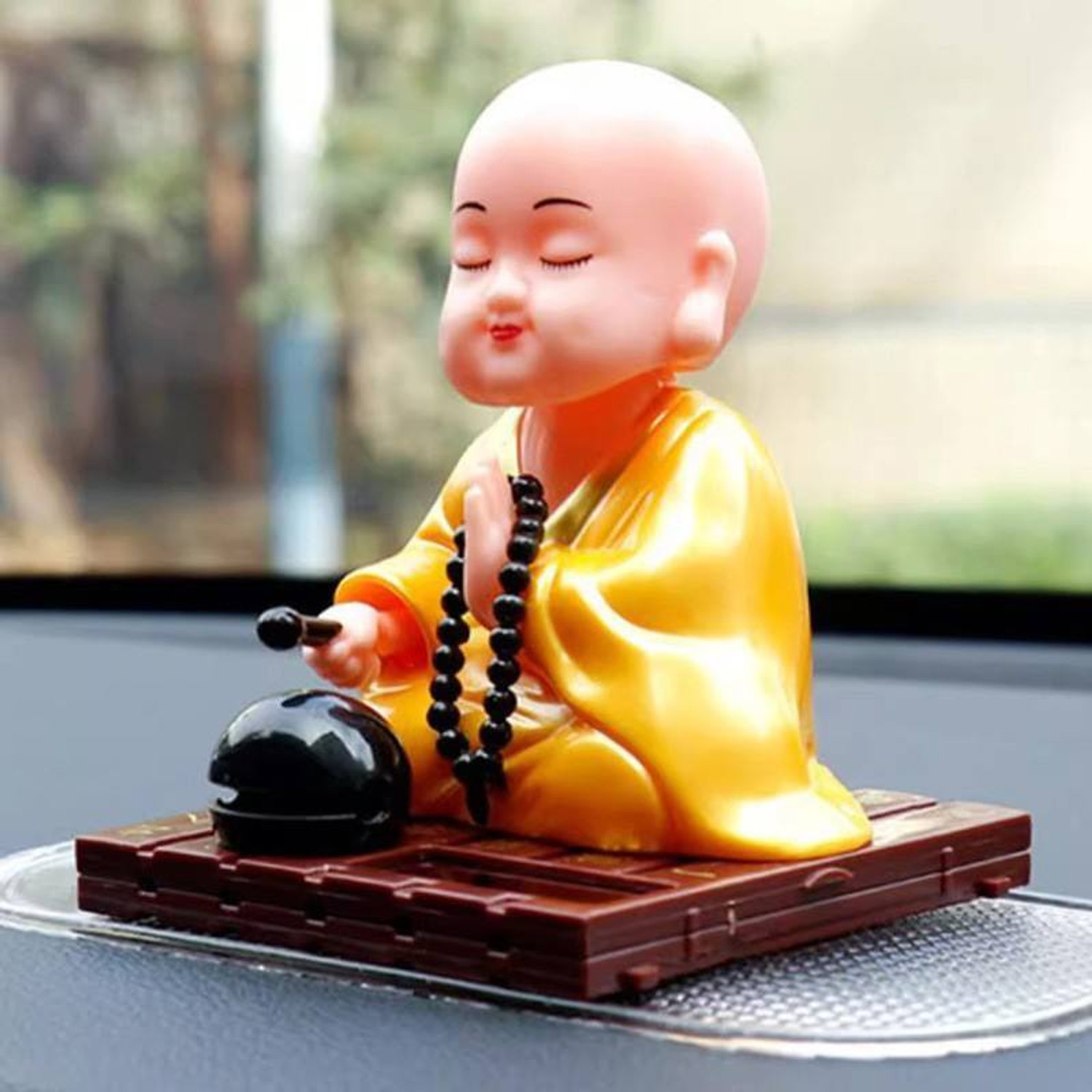 Image of Manthan Solar Powered Buddha Bobblehead car, office desks, or home decor Decorative Showpiece - 6 cm