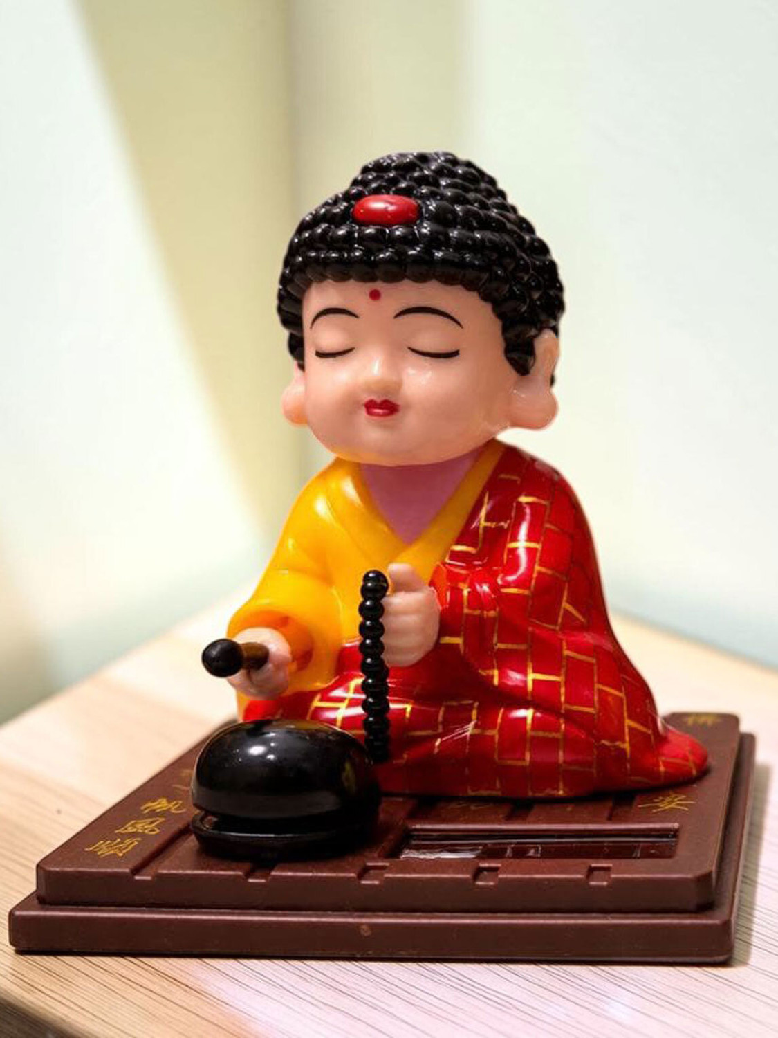 Image of DECOVATE Solar Powered Buddha Bobblehead car, office desks, or home decor Decorative Showpiece - 9.5 cm (Plastic, Red)