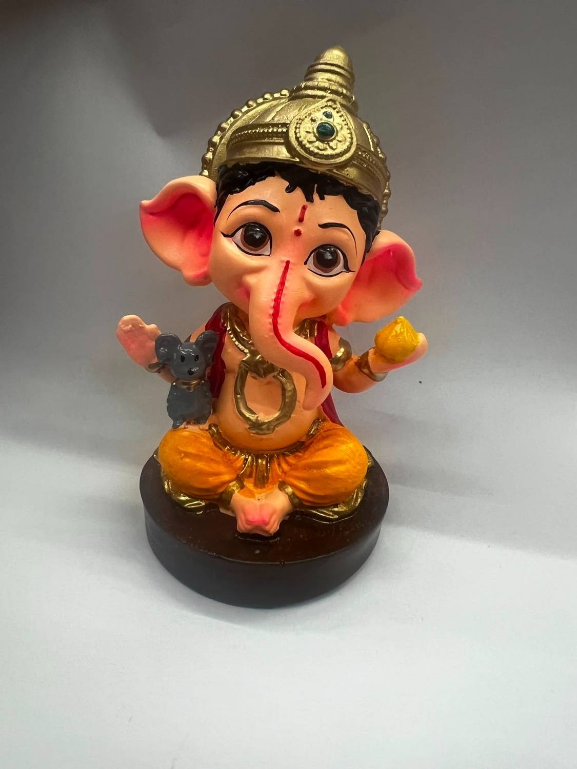 BLISSFUL Cute Ganesha Idol with Modak Bal Ganpati Murti Gift Figurine Showpiece Decorative Showpiece - 8 cm