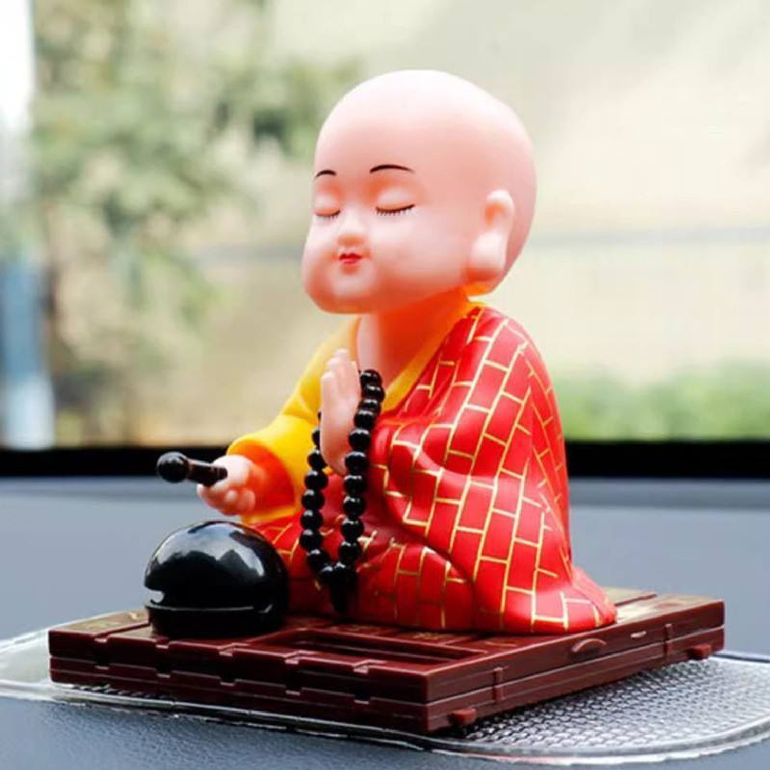 Image of Manthan Solar Powered Buddha Bobblehead car, office desks, or home decor Decorative Showpiece - 6 cm